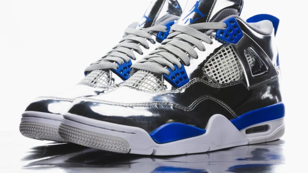 Side view of Usher's silver and blue Air Jordan sneakers from the Super Bowl halftime show.